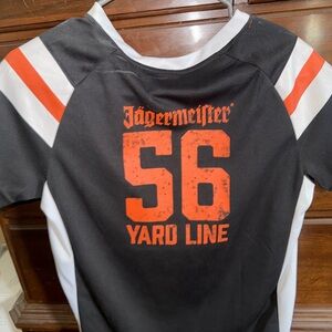 Jagermeister Women’s Black and Orange Lace-Up Jersey